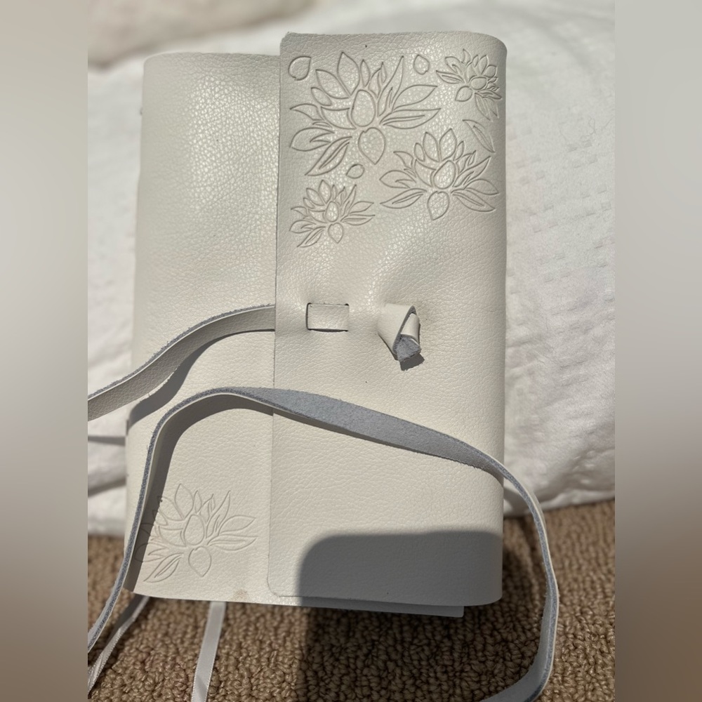 Leather journal with beautiful detailing. A great gift for someone special
